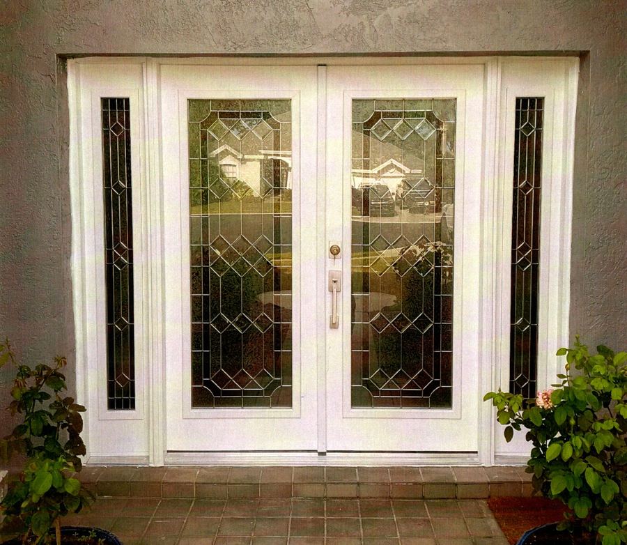 Custom entry door with decorative glass